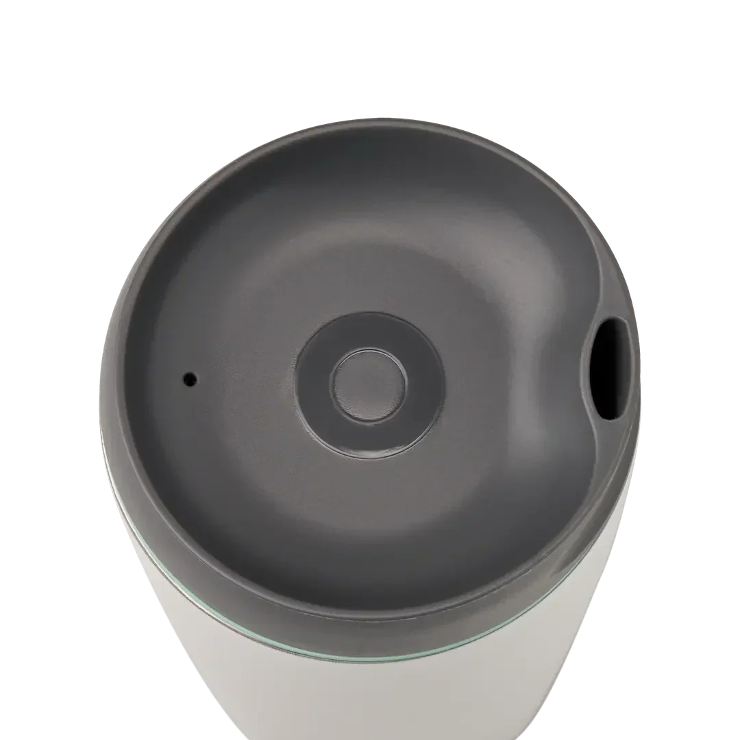 Owala SmoothSip 12oz in white body with gray lid and mint green accent ring, top view
